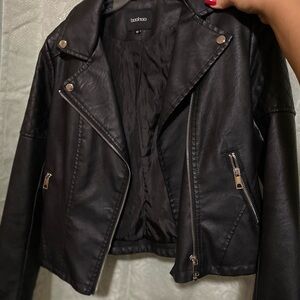 black leather jacket worn once. been in my closet for 2 years